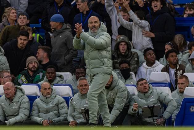 (251005) -- LONDON, Oct. 5, 2025 -- Chelsea s head coach Enzo Maresca reacts during the English Premier League match between Chelsea FC and Liverpool FC in London, Britain, on Oct. 4, 2025. FOR EDITORIAL USE ONLY. NOT FOR SALE FOR MARKETING OR ADVERTISING CAMPAIGNS. NO USE WITH UNAUTHORIZED AUDIO, VIDEO, DATA, FIXTURE LISTS, CLUB LEAGUE LOGOS OR LIVE SERVICES. ONLINE IN-MATCH USE LIMITED TO 45 IMAGES, NO VIDEO EMULATION. NO USE IN BETTING, GAMES OR SINGLE CLUB LEAGUE PLAYER PUBLICATIONS. (SP)BRITAIN-LONDON-FOOTBALL-ENGLISH PREMIER LEAGUE-CHELSEA VS LIVERPOOL LixYing