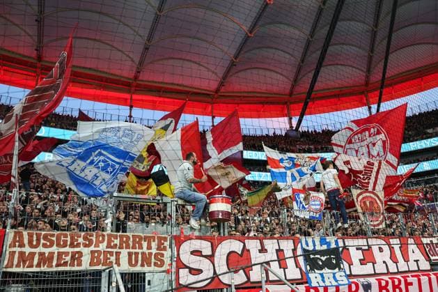 Soccer 1 Bundesliga Eintracht Frankfurt FC Bayern Munich on 04 10 2025 at Deutsche Bank Park in Frankfurt The fans of FC Bayern Munich Muenchen waving flags in the guest block MH