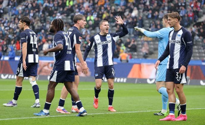 Linus Gechter, Deyovaisio Zeefuik, Kennet Eichhorn, Marten Winkler cheers after save by goalkeeper Tjark Ernst, Marton Dardai joy emotion jubilation Sport Football Soccer DFL 2 Bundesliga Men 8 Matchday Season 2025 2026 04 10 2025 Hertha BSC Berlin vs Preußen Münster DFL regulations prohibit any use of photographs as image sequences and or quasi video
