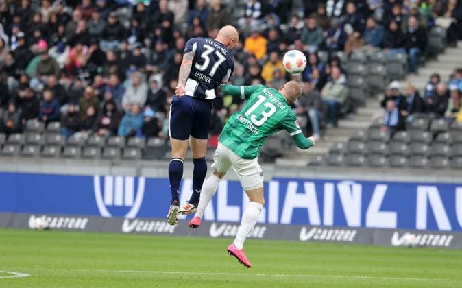 Toni Leistner, Lars Lokotsch duel match scene Action Sport Football Soccer DFL 2 Bundesliga Men 8 Matchday Season 2025 2026 04 10 2025 Hertha BSC Berlin vs Preußen Münster DFL regulations prohibit any use of photographs as image sequences and or quasi video