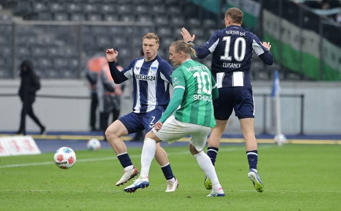 Julian Eitschberger, Marvin Schulz, Michael Cuisance duel Match scene Action Sport Soccer Football DFL 2 Bundesliga Men 8 Matchday Season 2025 2026 04 10 2025 Hertha BSC Berlin vs Preußen Münster DFL regulations prohibit any use of photographs as image sequences and or quasi video