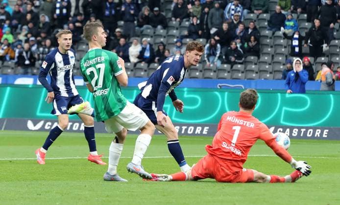 Jano ter Horst, Sebastian Grönning, goalkeeper Johannes Schenk parries duel Match scene Action Sport Soccer Football DFL 2 Bundesliga Men 8 Matchday Season 2025 2026 04 10 2025 Hertha BSC Berlin vs Preußen Münster DFL regulations prohibit any use of photographs as image sequences and or quasi video