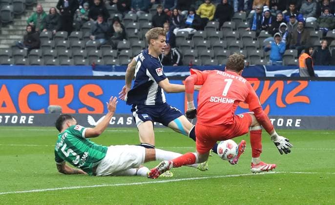 Yassine Bouchama, Luca Schuler, goalkeeper Johannes Schenk duel Match scene Action Sport Football Soccer DFL 2 Bundesliga Men 8 Matchday Season 2025 2026 04 10 2025 Hertha BSC Berlin vs Preußen Münster DFL regulations prohibit any use of photographs as image sequences and or quasi video