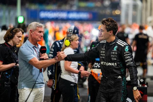 Singapore Grand Prix 2025 George Russell (Gbr) of Mercedes-AMG Petronas F1 Team 63 congratulated by David Coulthard on Saturday during Formula 1 Singapore Airlines Singapore Grand Prix 2025 at the Marina Bay Street Circuit on October 4, 2025 . Photo by Antoine Lapeyre ABACAPRESS.COM Singapore Singapore  Copyright: xLapeyrexAntoine ABACAx