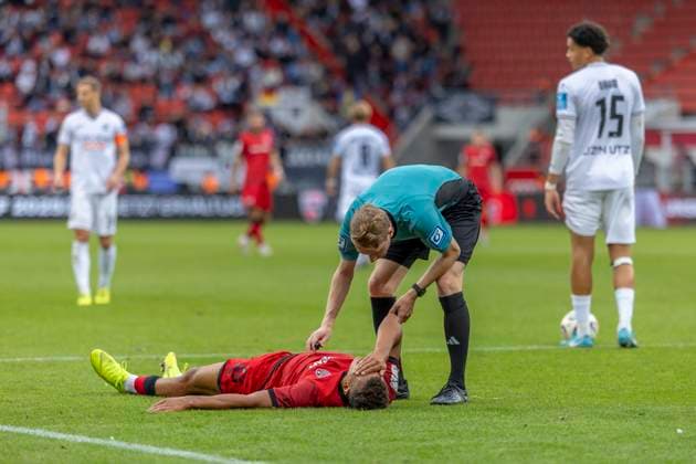 Ingolstadt, Germany 04 October 2025 3 Liga 2025 2026 FC Ingolstadt 04 vs SSV Ulm In the picture Marcel Costly FCI with pain on the ground DFB regulations prohibit any use of photographs as image sequences and or quasi video Audi Sportpark Bayern Copyright: xFotostandx xSchäferx