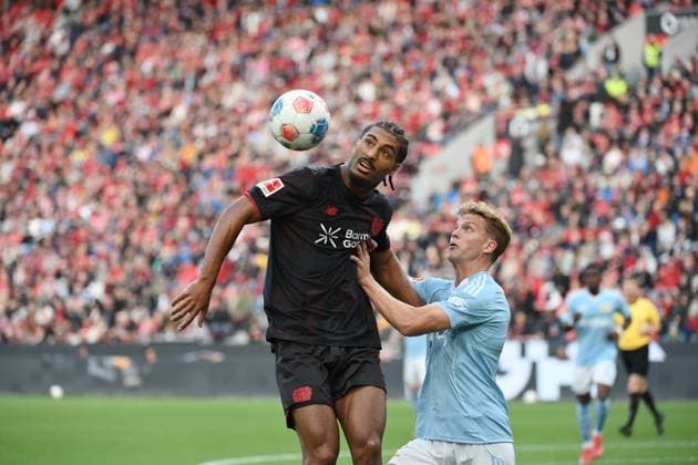Loic Bade Bayer 04 Leverkusen , Loïc BadÃ , li , against Andras Schäfer Union Berlin 04 10 2025, Soccer 1 Bundesliga, Season 2025 2026, 6 Matchday, Bayer 04 Leverkusen Union Berlin 2 0 DFL regulations prohibit any use of photographs as image sequences and or quasi video Leverkusen BayArena Nordrhein Westfalen Germany Team2