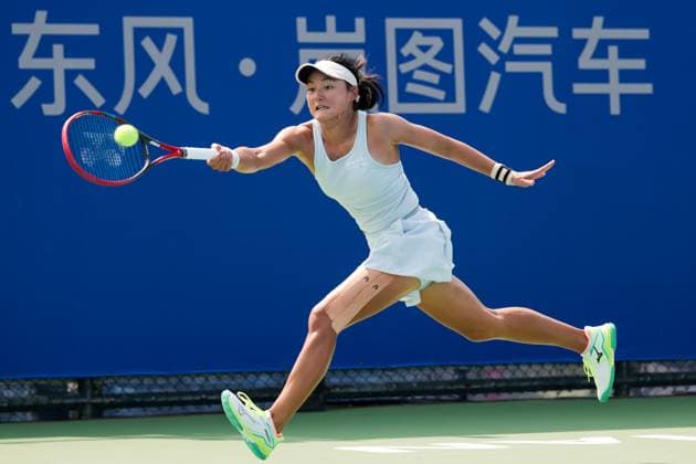 WUHAN, CHINA - OCTOBER 05: Wang Yafan of China returns a shot in the Women s Singles Qualifying second round match against Katerina Siniakova of Czech Republic on day 2 of 2025 Wuhan Open at Optics Valley International Tennis Center on October 5, 2025 in Wuhan, Hubei Province of China.  Copyright: xVCGx 111595174120