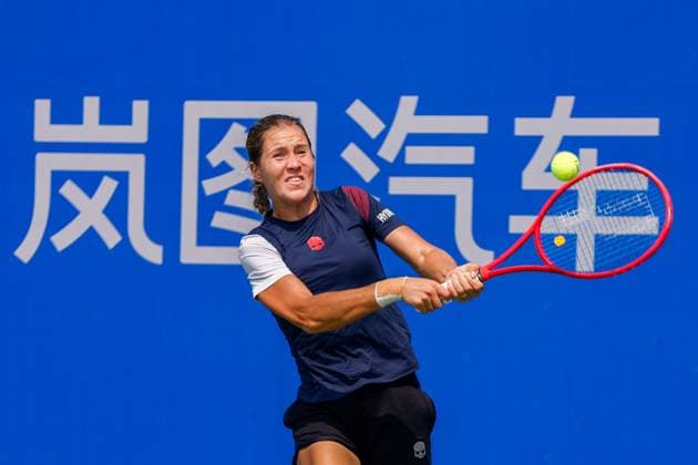 WUHAN, CHINA - OCTOBER 05: Anastasia Zakharova returns a shot in the Women s Singles Qualifying second round match against Bianca Andreescu of Canada on day 2 of 2025 Wuhan Open at Optics Valley International Tennis Center on October 5, 2025 in Wuhan, Hubei Province of China.  Copyright: xVCGx 111595178922
