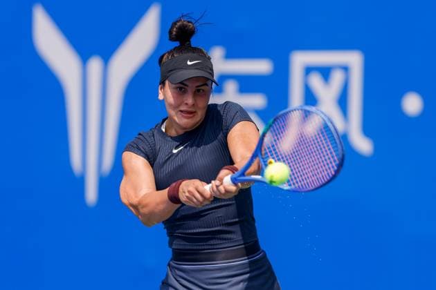 WUHAN, CHINA - OCTOBER 05: Bianca Andreescu of Canada returns a shot in the Women s Singles Qualifying second round match against Anastasia Zakharova on day 2 of 2025 Wuhan Open at Optics Valley International Tennis Center on October 5, 2025 in Wuhan, Hubei Province of China.  Copyright: xVCGx 111595178904