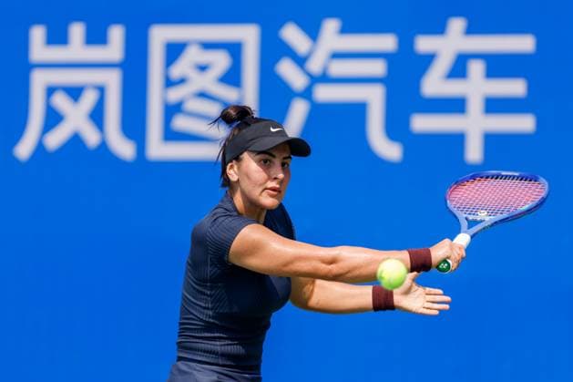 WUHAN, CHINA - OCTOBER 05: Bianca Andreescu of Canada returns a shot in the Women s Singles Qualifying second round match against Anastasia Zakharova on day 2 of 2025 Wuhan Open at Optics Valley International Tennis Center on October 5, 2025 in Wuhan, Hubei Province of China.  Copyright: xVCGx 111595178906