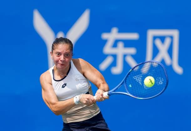 WUHAN, CHINA - OCTOBER 05: Antonia Ruzic of Croatia returns a shot in the Women s Singles Qualifying second round match against Emiliana Arango of Colombia on day 2 of 2025 Wuhan Open at Optics Valley International Tennis Center on October 5, 2025 in Wuhan, Hubei Province of China.  Copyright: xVCGx 111595182616