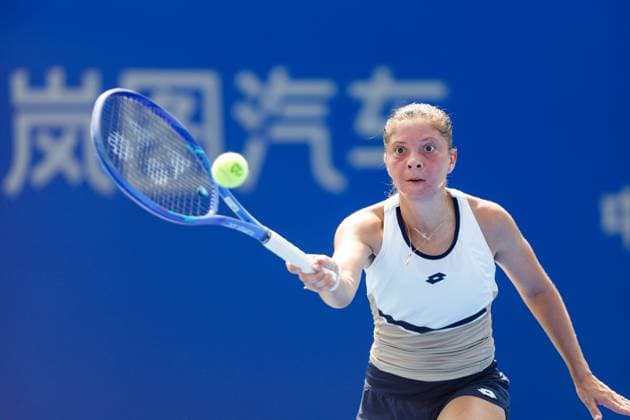 WUHAN, CHINA - OCTOBER 05: Antonia Ruzic of Croatia returns a shot in the Women s Singles Qualifying second round match against Emiliana Arango of Colombia on day 2 of 2025 Wuhan Open at Optics Valley International Tennis Center on October 5, 2025 in Wuhan, Hubei Province of China.  Copyright: xVCGx 111595182604