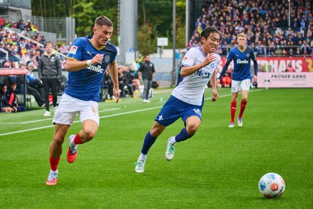 04 10 2025, Soccer, Men, 2 BL Bundesliga , Season 2025 2026, Holstein Kiel SV Darmstadt 98, Matchday 8 Adrian Kapralik vs Hiroki Akiyama Kiel, Holstein Stadion Holstein Stadion Schleswig Holstein Germany