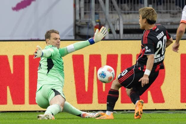 Eintracht Frankfurt FC Bayern Munich, 1 FBL From close range goalkeeper Manuel Neuer Bayern Munich, 1 defends a shot from Ritsu Doan Eintracht Frankfurt, 20 from Bundesliga match between Eintracht Frankfurt and FC Bayern Munich on October 4, 2025 at Deutsche Bank Park in Frankfurt am Main , Frankfurt am Main Hessen Germany Deutsche Bank Park