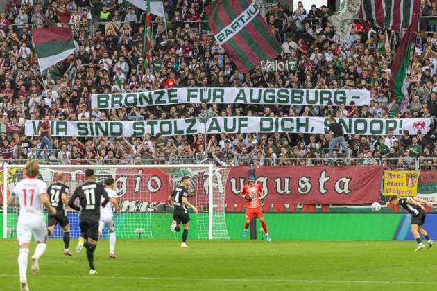 FC Augsburg Fans with banner, FC Augsburg vs VfL Wolfsburg, Football, 1 Bundesliga, 6 Matchday, 04 10 2025 DFB regulations prohibit any use of photographs as image sequences and or quasi video Augsburg Bayern Germany Copyright: xkolbert-press PeterxFastlx