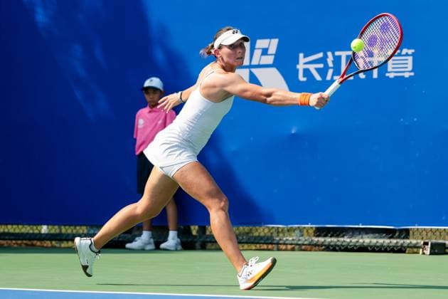 WUHAN, CHINA - OCTOBER 05: Varvara Gracheva of France returns a shot in the Women s Singles Qualifying second round match against Iva Jovic of the United States on day 2 of 2025 Wuhan Open at Optics Valley International Tennis Center on October 5, 2025 in Wuhan, Hubei Province of China.  Copyright: xVCGx 111595195399