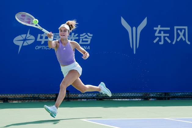 WUHAN, CHINA - OCTOBER 05: Iva Jovic of the United States returns a shot in the Women s Singles Qualifying second round match against Varvara Gracheva of France on day 2 of 2025 Wuhan Open at Optics Valley International Tennis Center on October 5, 2025 in Wuhan, Hubei Province of China.  Copyright: xVCGx 111595195392