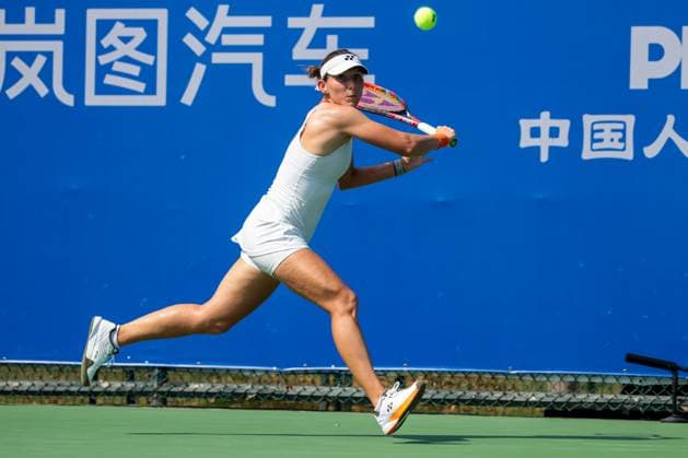 WUHAN, CHINA - OCTOBER 05: Varvara Gracheva of France returns a shot in the Women s Singles Qualifying second round match against Iva Jovic of the United States on day 2 of 2025 Wuhan Open at Optics Valley International Tennis Center on October 5, 2025 in Wuhan, Hubei Province of China.  Copyright: xVCGx 111595195390