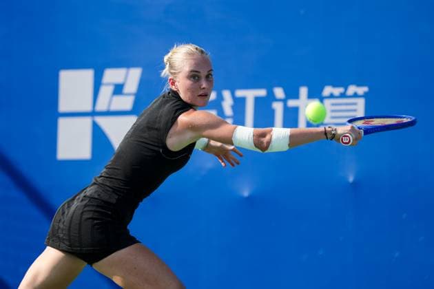 WUHAN, CHINA - OCTOBER 05: Polina Kudermetova returns a shot in the Women s Singles Qualifying second round match against Viktoriya Tomova of Bulgaria on day 2 of 2025 Wuhan Open at Optics Valley International Tennis Center on October 5, 2025 in Wuhan, Hubei Province of China.  Copyright: xVCGx 111595195968
