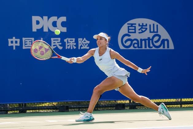 WUHAN, CHINA - OCTOBER 05: Viktoriya Tomova of Bulgaria returns a shot in the Women s Singles Qualifying second round match against Polina Kudermetova on day 2 of 2025 Wuhan Open at Optics Valley International Tennis Center on October 5, 2025 in Wuhan, Hubei Province of China.  Copyright: xVCGx 111595195956
