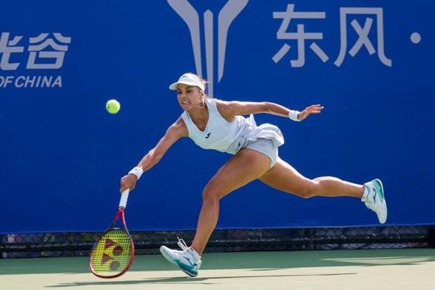WUHAN, CHINA - OCTOBER 05: Viktoriya Tomova of Bulgaria returns a shot in the Women s Singles Qualifying second round match against Polina Kudermetova on day 2 of 2025 Wuhan Open at Optics Valley International Tennis Center on October 5, 2025 in Wuhan, Hubei Province of China.  Copyright: xVCGx 111595195952