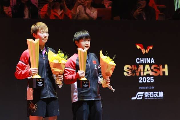 BEIJING, CHINA - OCTOBER 05: Champion Wang Manyu (L) of China, runner-up Sun Yingsha of China pose during the medal ceremony following the Women s Singles Final match on day 11 of the WTT China Smash 2025 at Shougang Park on October 5, 2025 in Beijing, China.  Copyright: xVCGx 111595203550