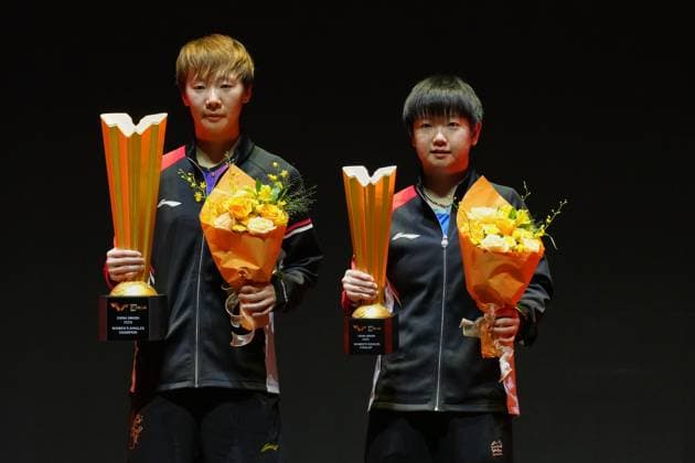 BEIJING, CHINA - OCTOBER 05: Champion Wang Manyu (L) of China and runner-up Sun Yingsha of China pose during the medal ceremony following the Women s Singles Final match on day 11 of the WTT China Smash 2025 at Shougang Park on October 5, 2025 in Beijing, China.  Copyright: xVCGx 111595205626