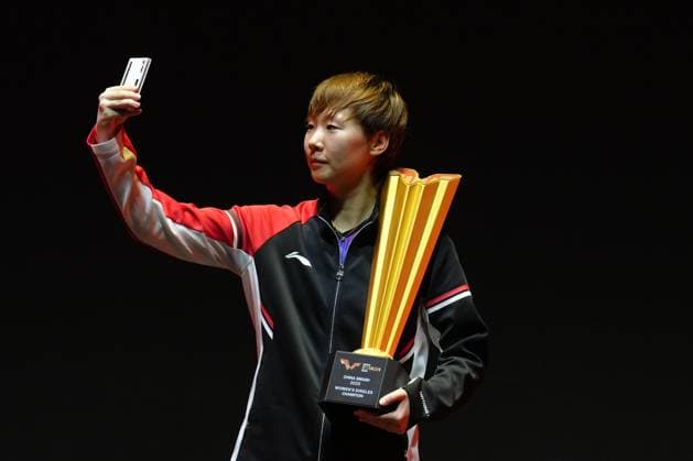 BEIJING, CHINA - OCTOBER 05: Champion Wang Manyu of China takes a selfie during the medal ceremony following the Women s Singles Final match against Sun Yingsha of China on day 11 of the WTT China Smash 2025 at Shougang Park on October 5, 2025 in Beijing, China.  Copyright: xVCGx 111595205629