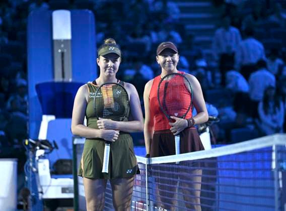 (251005) -- BEIJING, Oct. 5, 2025 -- Amanda Anisimova (R) and Linda Noskova pose for photos before the women s singles final match between Amanda Anisimova of the United States and Linda Noskova of the Czech Republic at 2025 China Open tennis tournament in Beijing, China, Oct. 5, 2025. ) (SP)CHINA-BEIJING-TENNIS-CHINA OPEN-WOMEN S SINGLES-FINAL (CN) HuxJingwen 