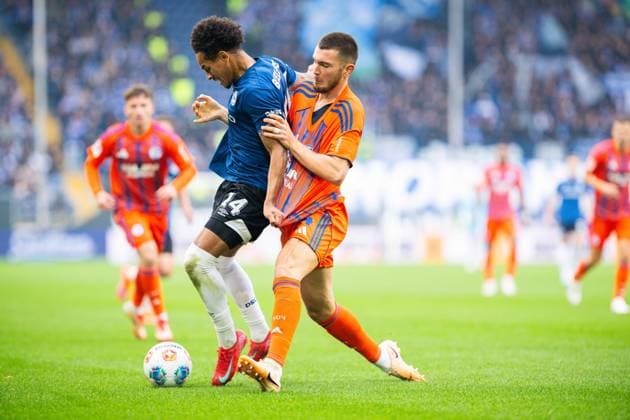 05 10 2025 Soccer, 2025 2026, 2 Bundesliga, Matchday 8, DSC Arminia Bielefeld FC Schalke 04 L R Monju Momuluh Bielefeld , Hasan Kurucay Schalke DFL REGULATIONS PROHIBIT ANY USE OF PHOTOGRAPHS AS IMAGE SEQUENCES AND OR QUASI VIDEO