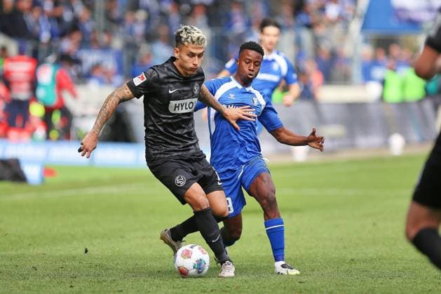 Magdeburg, Saxony-Anhalt, Germany, 05 10 2025 Avnet Arena 8 Matchday, Season 2025 26, 2 Soccer Bundesliga 1 FC Magdeburg Sportvereinigung 07 Elversberg Nicholas Mickelson 02, SV Elversberg and Lubambo Musonda 19, 1 FC Magdeburg in duel Copyright: xdtsxNachrichtenagenturx dts_86467