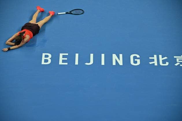 (251005) -- BEIJING, Oct. 5, 2025 -- Amanda Anisimova reacts after winning the women s singles final match between Amanda Anisimova of the United States and Linda Noskova of the Czech Republic at 2025 China Open tennis tournament in Beijing, China, Oct. 5, 2025. ) (SP)CHINA-BEIJING-TENNIS-CHINA OPEN-WOMEN S SINGLES-FINAL (CN) HuxJingwen 