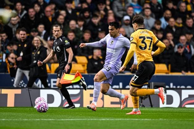 5th October 2025; Molineux Stadium, Wolverhampton, West Midlands, England; Premier League Football, Wolverhampton Wanderers versus Brighton and Hove Albion; Diego Gomez of Brighton looks to beat Ladislav Krejci of Wolverhampton Wanderers  GodfreyxPitt