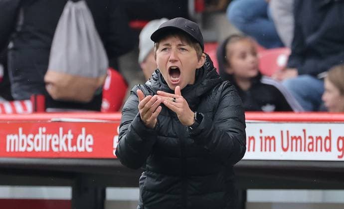 Coach Ailien Poese cheers on Action Upper Body Sport Football Soccer Womens Bundesliga 5 Matchday Season 2025 2026 05 10 2025 1 FC Union Berlin vs SC Freiburg SCF DFL regulations prohibit any use of photographs as image sequences and or quasi video