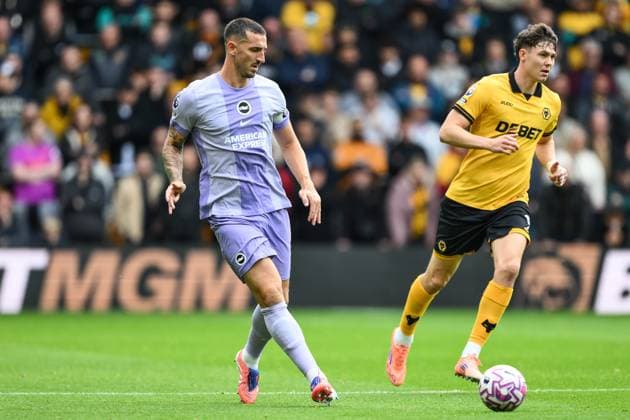 Wolverhampton, England, 5th October 2025. Lewis Dunk of Brighton & Hove Albion in action during the Wolverhampton Wanderers vs Brighton and Hove Albion Premier League match at Molineux, Wolverhampton. Picture credit should read: Craig Thomas Sportimage EDITORIAL USE ONLY. No use with unauthorised audio, video, data, fixture lists, club league logos or live services. Online in-match use limited to 120 images, no video emulation. No use in betting, games or single club league player publications. SPI_030_CT_Wolves_v_Brighton SPI-4200-0030