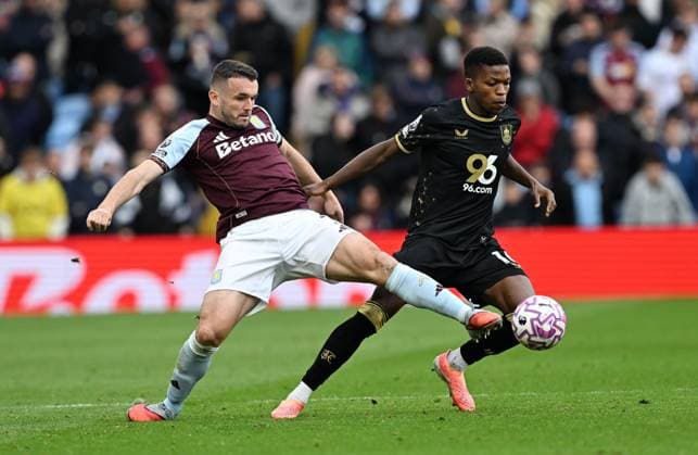 John McGinn of Aston Villa and Florentino Luis of Burnley Aston Villa v Burnley, Premier League, Football, Villa Park, Birmingham, UK - 05 Oct 2025Birmingham Villa Park United Kingdom EDITORIAL USE ONLY No use with unauthorised audio, video, data, fixture lists, club league logos or live services. Online in-match use limited to 120 images, no video emulation. No use in betting, games or single club league player publications. Copyright: xAnnaxGowthorpe Shutterstockx 15515860y