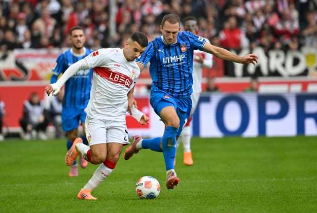 duel, action Badredine Bouanani VfB Stuttgart 27 vs Jonas Foehrenbach 1 FC Heidenheim 1846 FCH 19 VfB Stuttgart vs 1 FC Heidenheim FCH 05 10 2025 DFL REGULATIONS PROHIBIT ANY USE OF PHOTOGRAPHS AS IMAGE SEQUENCES AND OR QUASI VIDEO VfB Stuttgart vs 1 FC Heidenheim FCH
