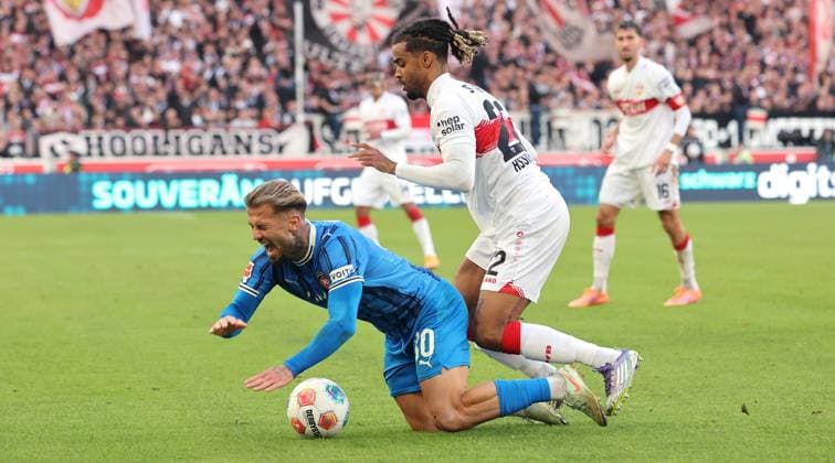 Stuttgart , Bundesliga soccer VfB Stuttgart vs 1 FC Heidenheim, f l Niklas Dorsch Heidenheim , Lorenz Assignon VfB According to the regulations of the DFL German Soccer League, it is prohibited to use or have used photographs taken in the stadium and or of the match in the form of sequential images and or video-like photo series
