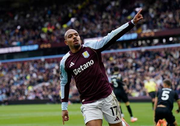 Birmingham, England, 5th October 2025. Donyell Malen of Aston Villa celebrates after scoring the second goal during the Aston Villa vs Burnley Premier League match at Villa Park, Birmingham. Picture credit should read: Andrew Yates Sportimage EDITORIAL USE ONLY. No use with unauthorised audio, video, data, fixture lists, club league logos or live services. Online in-match use limited to 120 images, no video emulation. No use in betting, games or single club league player publications. SPI_024_AY_VILLA_BURNLEY SPI-4198-0023