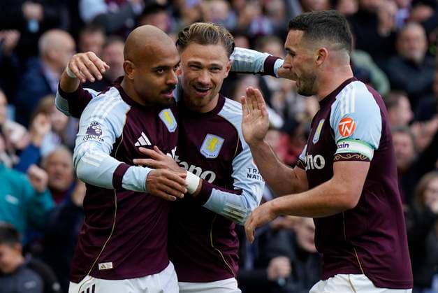 Birmingham, England, 5th October 2025. Donyell Malen of Aston Villa (L) celebrates after scoring the second goal with Matty Cash of Aston Villa(C) and John McGinn of Aston Villa during the Aston Villa vs Burnley Premier League match at Villa Park, Birmingham. Picture credit should read: Andrew Yates Sportimage EDITORIAL USE ONLY. No use with unauthorised audio, video, data, fixture lists, club league logos or live services. Online in-match use limited to 120 images, no video emulation. No use in betting, games or single club league player publications. SPI_025_AY_VILLA_BURNLEY SPI-4198-0024