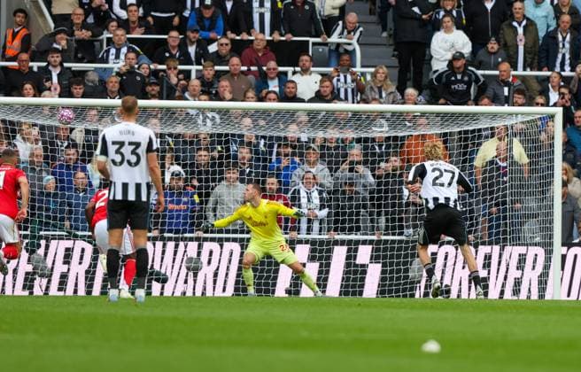 Newcastle Upon Tyne, England, 5th October 2025. Nick Woltemade of Newcastle United shoots to score a penalty for the second goal during the Newcastle United vs Nottingham Forest Premier League match at St. James Park, Newcastle Upon Tyne. Picture credit should read: Nigel Roddis Sportimage EDITORIAL USE ONLY. No use with unauthorised audio, video, data, fixture lists, club league logos or live services. Online in-match use limited to 120 images, no video emulation. No use in betting, games or single club league player publications. SPI_024_NR_NEWC_NOTT SPI-4199-0024