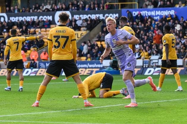 Wolverhampton, England, 5th October 2025. Jan Paul van Hecke of Brighton & Hove Albion celebrates his goal to make it 1-1 during the Wolverhampton Wanderers vs Brighton and Hove Albion Premier League match at Molineux, Wolverhampton. Picture credit should read: Craig Thomas Sportimage EDITORIAL USE ONLY. No use with unauthorised audio, video, data, fixture lists, club league logos or live services. Online in-match use limited to 120 images, no video emulation. No use in betting, games or single club league player publications. SPI_053_CT_Wolves_v_Brighton SPI-4200-0053