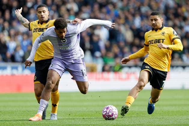Wolverhampton Wanderers v Brighton and Hove Albion Premier League Georginio Rutter of Brighton and Hove Albion holds off Joao Gomes of Wolverhampton Wanderers during the Premier League match at Molineux, Wolverhampton UK Newspapers OUT Copyright: xJackxTylerx FIL-22325-0102