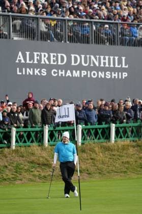 5th October 2025; The Old Course at St Andrews, Fife, Scotland; Alfred Dunhill Links Golf Championship, Final Round; Robert MacIntyre awaits his turn to putt in front of the grandstand on the 18th green at The Old Course at St Andrews  AlecxBrown