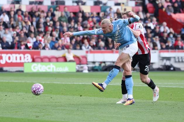 London, England, 5th October 2025. Erling Haaland of Manchester City scores the opening goal during the Brentford vs Manchester City Premier League match at Gtech Community Stadium, London. Picture credit should read: Paul Terry Sportimage EDITORIAL USE ONLY. No use with unauthorised audio, video, data, fixture lists, club league logos or live services. Online in-match use limited to 120 images, no video emulation. No use in betting, games or single club league player publications. SPI_006_PT_Brentford_Man_City SPI-4202-0006