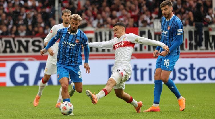Stuttgart , Bundesliga soccer VfB Stuttgart vs 1 FC Heidenheim, f l Niklas Dorsch Heidenheim , Bilal El Khannouss VfB , Julian Niehues Heidenheim According to the regulations of the DFL German Soccer League, it is prohibited to use or have used photographs taken in the stadium and or of the match in the form of sequential images and or video-like photo series