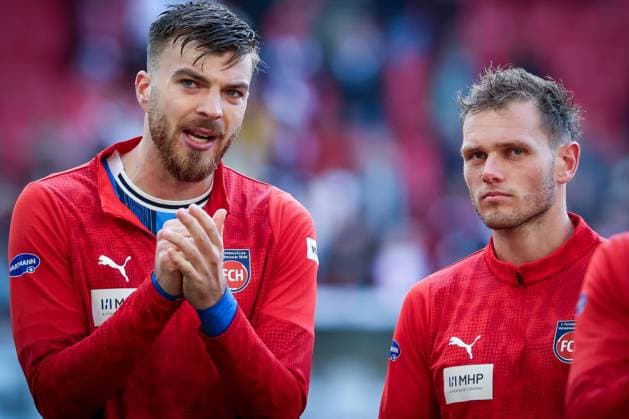 Julian Niehues 16 1FC Heidenheim 1846 and Tim Siersleben 4 1FC Heidenheim 1846 disappointed with the fans, VfB Stuttgart vs 1 FC Heidenheim 1846, DFL, Bundesliga, Saison 2025 2026, MHP Arena, Hinrunde, 6 Spieltag, 05 10 2025 DFB regulations prohibit any use of photographs as image sequences and or quasi video Stuttgart Baden Wuerttemberg Germany Copyright: xkolbert-press MartinxAgüerax