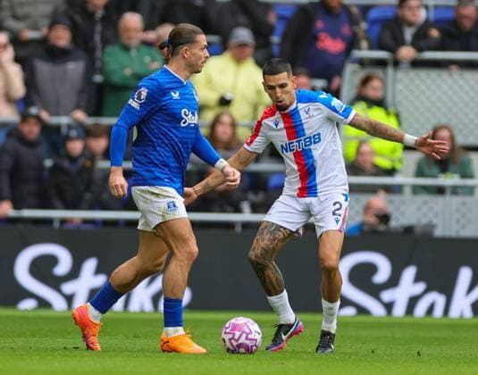 5th October 2025; Hill Dickinson Stadium, Liverpool, England; Premier League Football, Everton versus Crystal Palace; Daniel Munoz of Crystal Palace tracks Jack Grealish of Everton FC  RogerxEvans