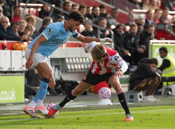 Brentford v Manchester City Premier League Matheus Nunes of Manchester City takes on Mikkel Damsgaard of Brentford during the Premier League match at the Gtech Community Stadium, Brentford UK Newspapers OUT Copyright: xGraemexWilcocksonx FIL-22323-0077