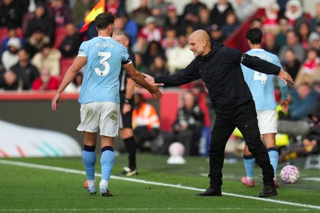 Premier League Brentford v Manchester City Pep Guardiola manager of Manchester City and Ruben Dias of Manchester City during the Premier League match Brentford vs Manchester City at The Gtech Community Stadium, London, United Kingdom, 5th October 2025 (Photo by Harvey Murphy News Images) Copyright: xHarveyxMurphy NewsxImagesx